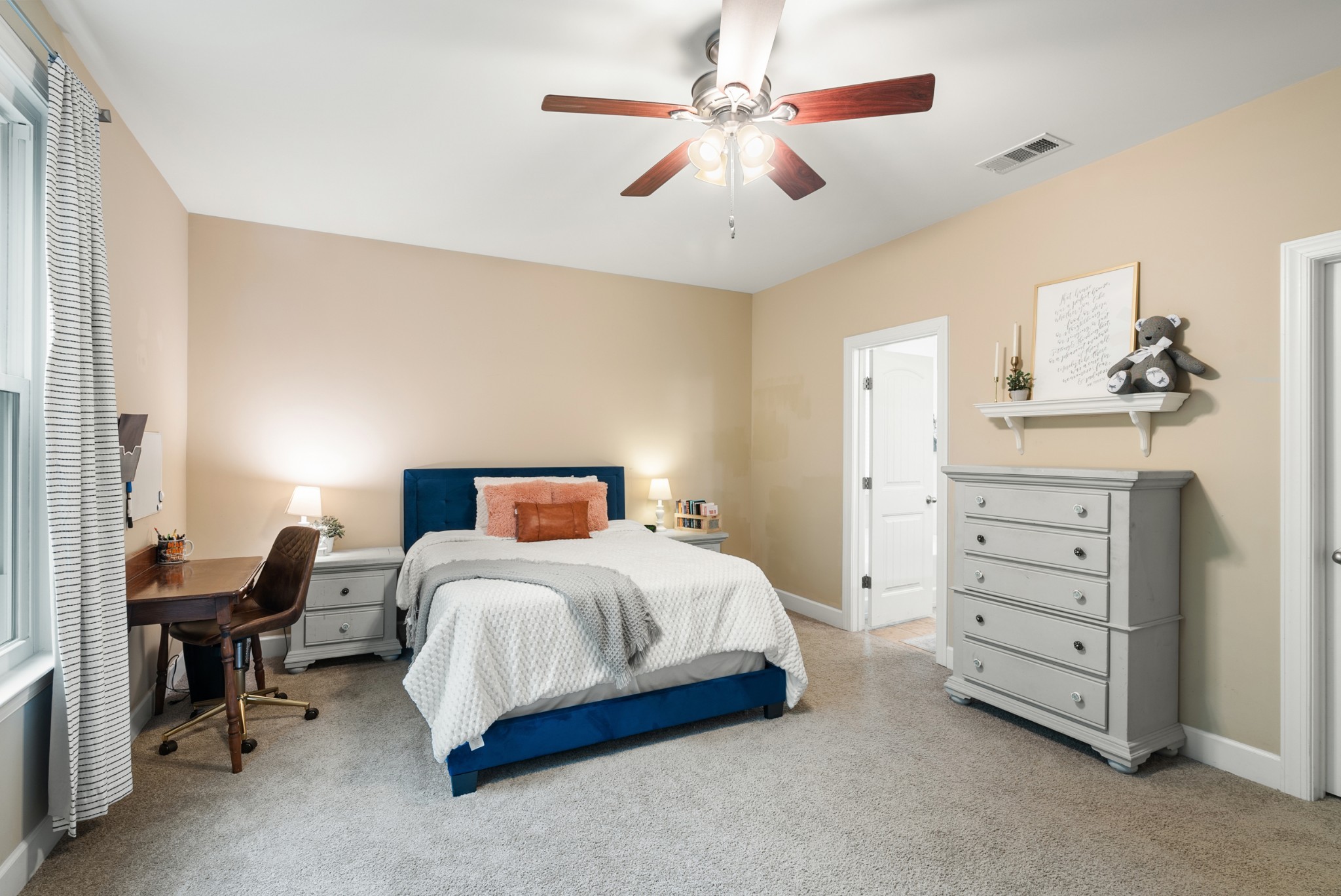 2014 Morton Drive Spring Hill, TN 37174 - Photo 20 of 44 a bedroom with a bed and a chandelier