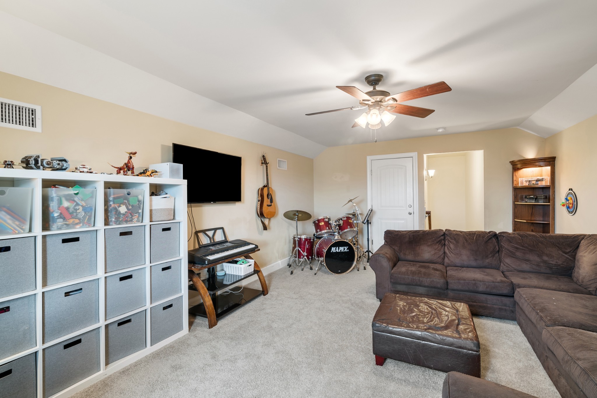 2014 Morton Drive Spring Hill, TN 37174 - Photo 33 of 44 a living room with furniture and a flat screen tv