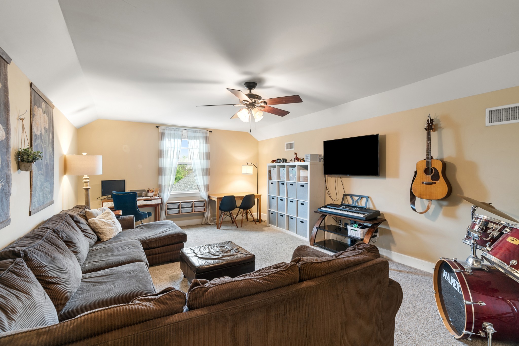 2014 Morton Drive Spring Hill, TN 37174 - Photo 36 of 44 a living room with furniture and a flat screen tv