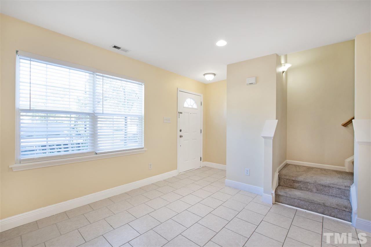 8918 Thornton Garden Lane Raleigh, NC 27616 - Photo 6 of 26 a view of an empty room with window