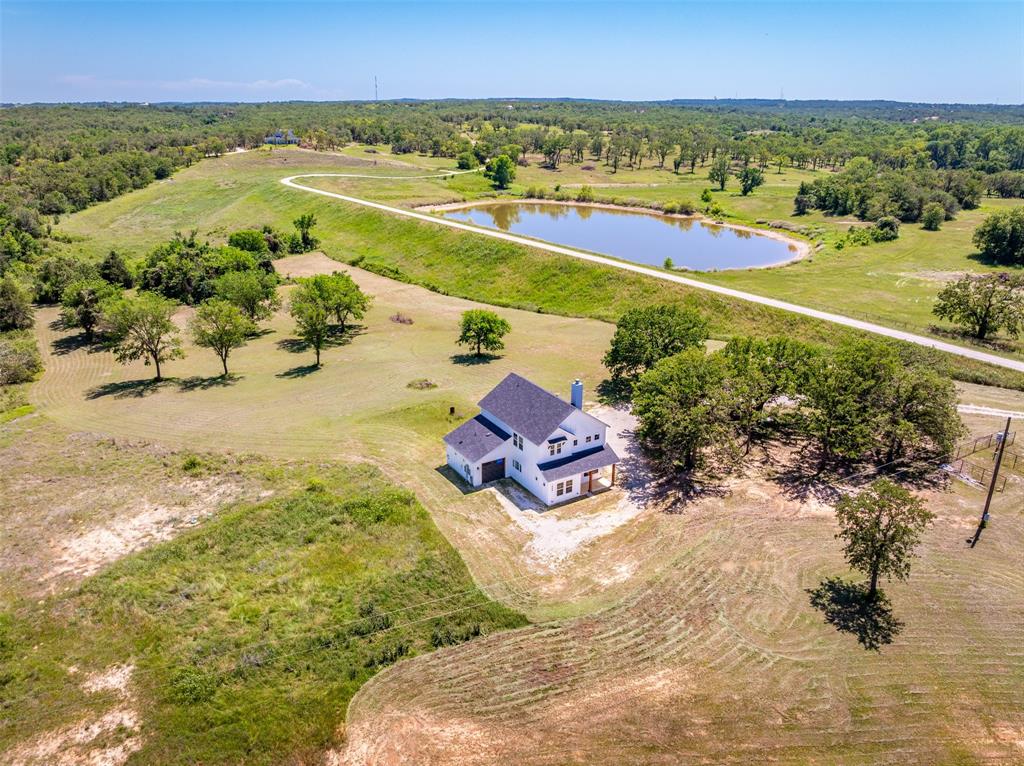 1874 County Road Springtown, TX 76082 - Photo 23 of 24 a view of an ocean and city