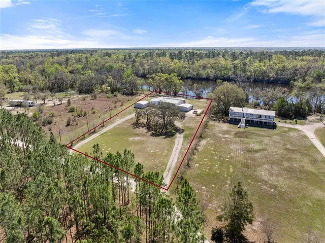 a view of a outdoor space with lake view and mountain view