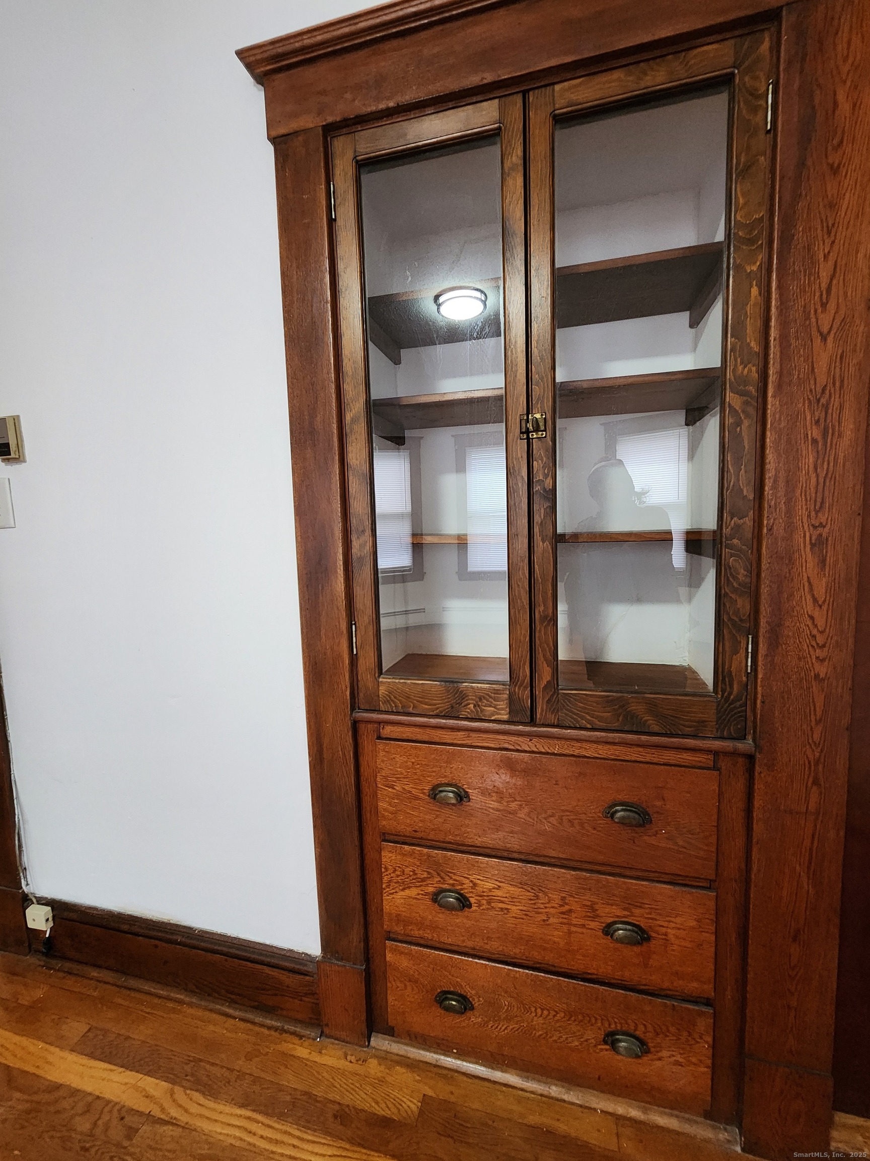 106 Lyons Street New Britain, CT 06052 - Photo 11 of 24 a view of walk in closet with empty racks