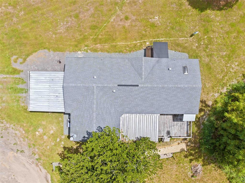 33320 Larkin Road Dade City, FL 33523 - Photo 45 of 60 aerial view of a house with a yard and wooden fence