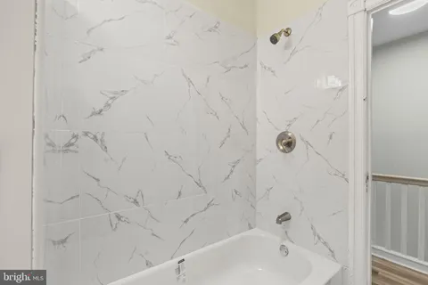 a bathroom with a bathtub