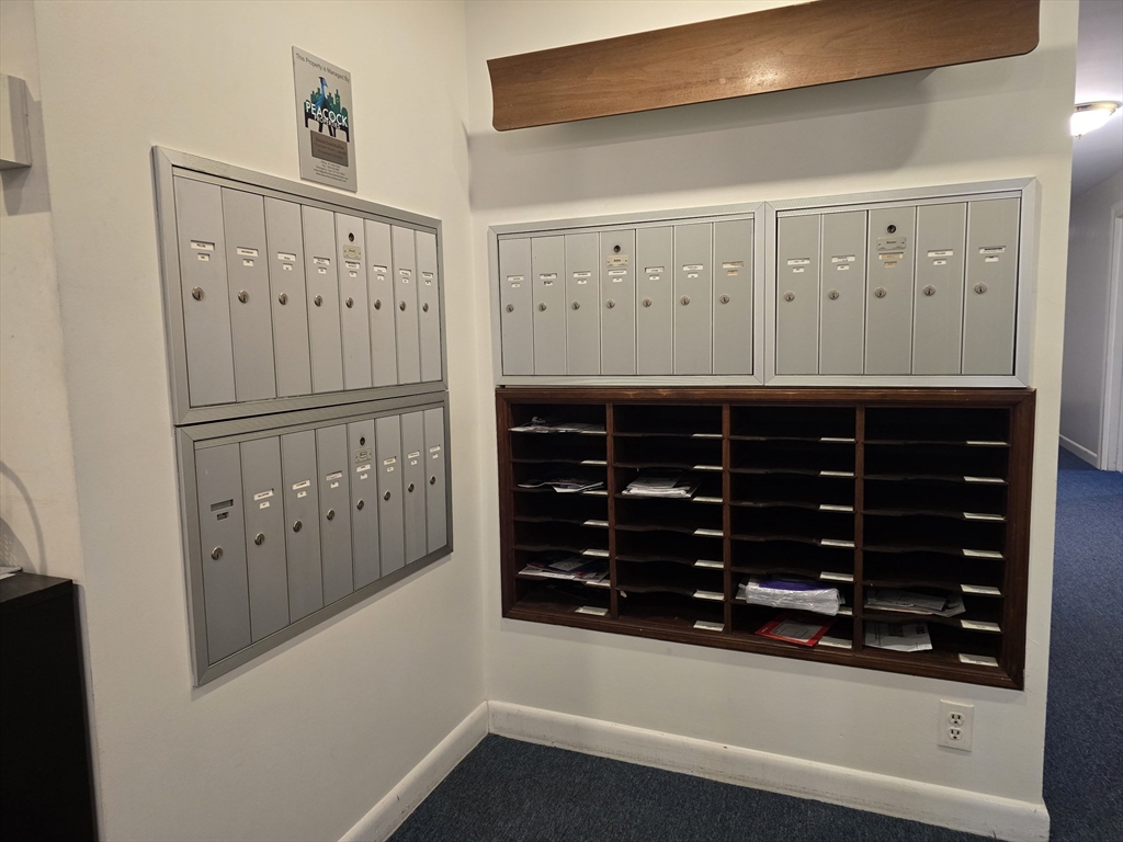 114 Pleasant Street, Unit 306 Arlington, MA 02476 - Photo 14 of 16 a bathroom with a bathtub