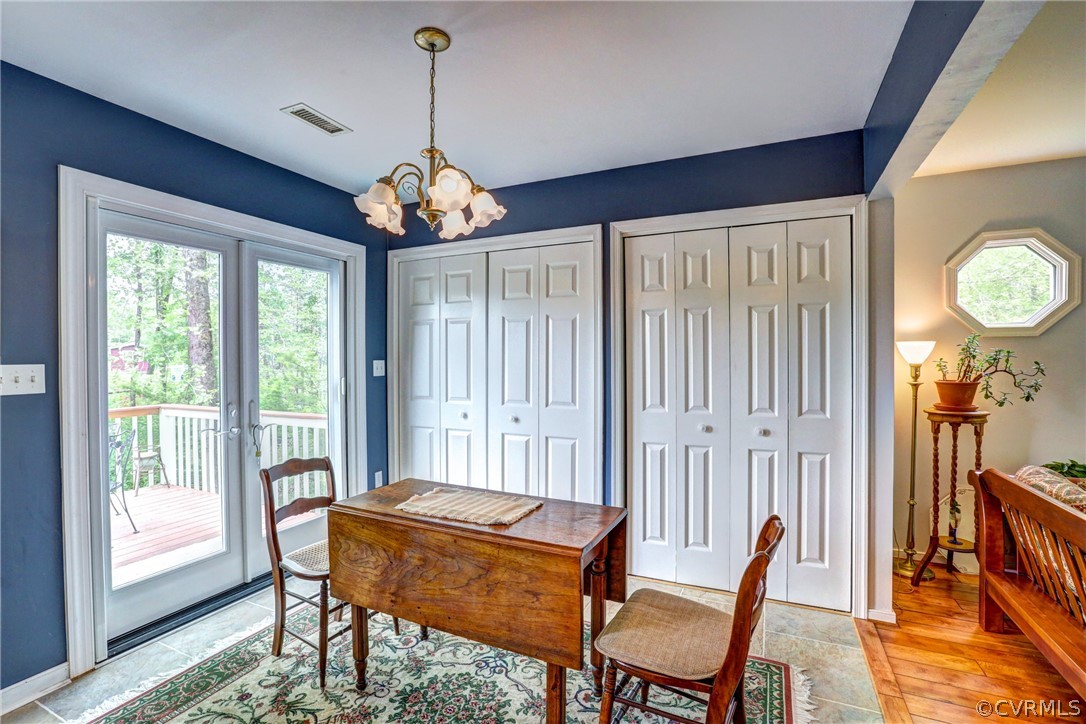 4151 Broad St Road Gum Spring, VA 23065 - Photo 12 of 38 a view of a dining room with furniture window and wooden floor