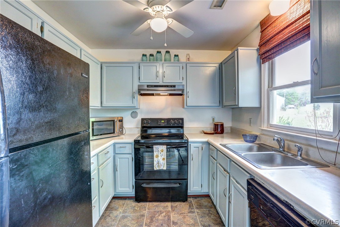 4151 Broad St Road Gum Spring, VA 23065 - Photo 15 of 38 a kitchen with stainless steel appliances granite countertop a sink stove and refrigerator