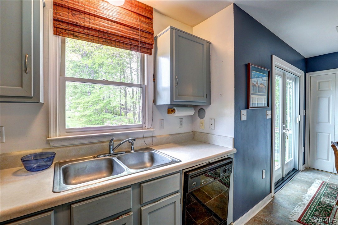 4151 Broad St Road Gum Spring, VA 23065 - Photo 16 of 38 a kitchen with a sink cabinets and window