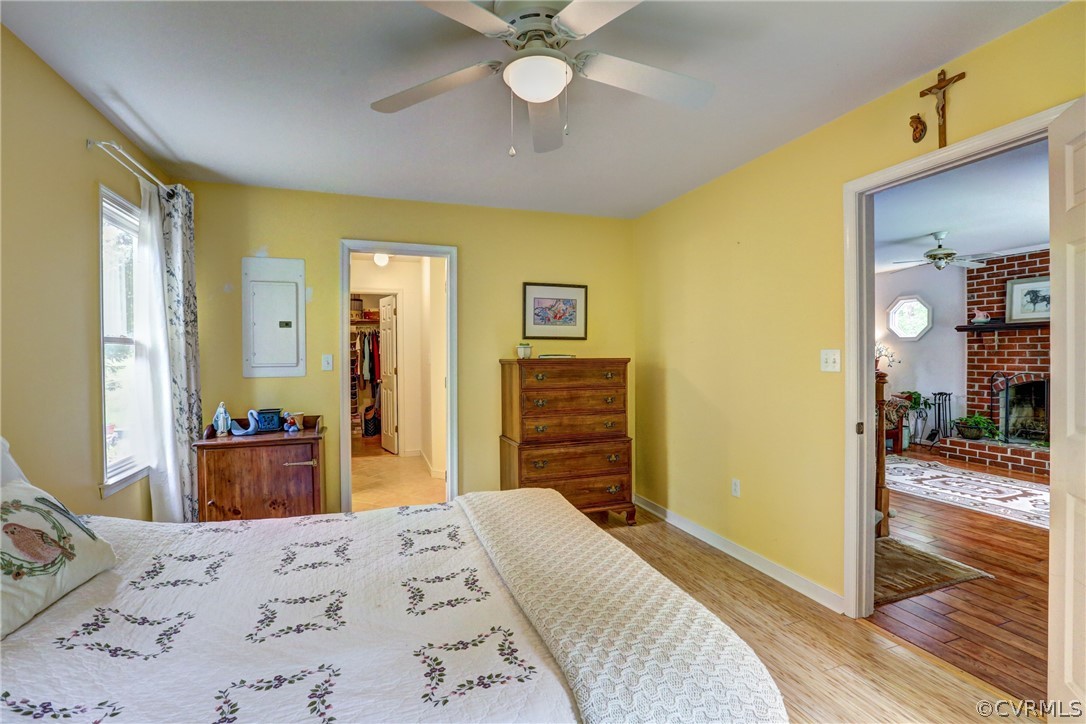 4151 Broad St Road Gum Spring, VA 23065 - Photo 22 of 38 a bedroom with a bed and wooden floor