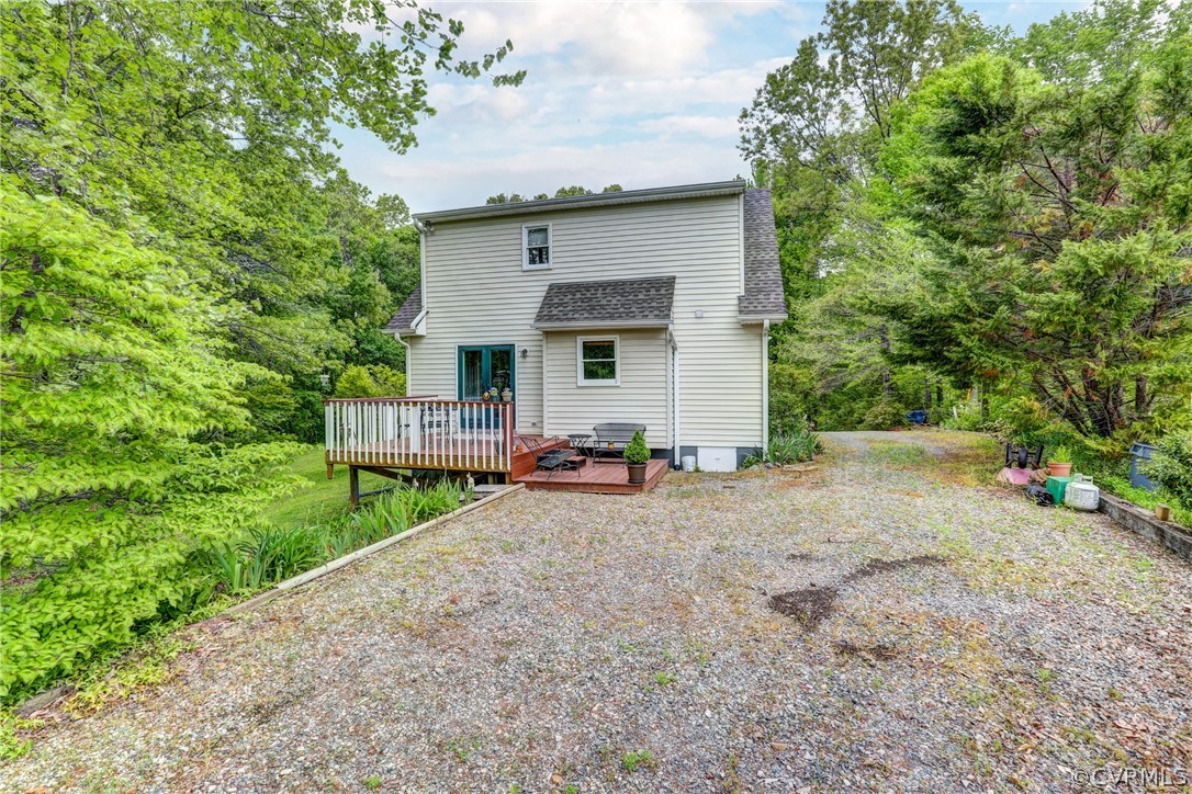 4151 Broad St Road Gum Spring, VA 23065 - Photo 36 of 38 a view of a house with a patio and a yard