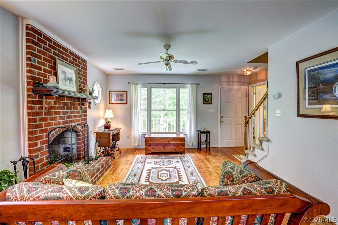 4151 Broad St Road Gum Spring, VA 23065 - Photo 10 of 38 a living room with furniture and a fireplace