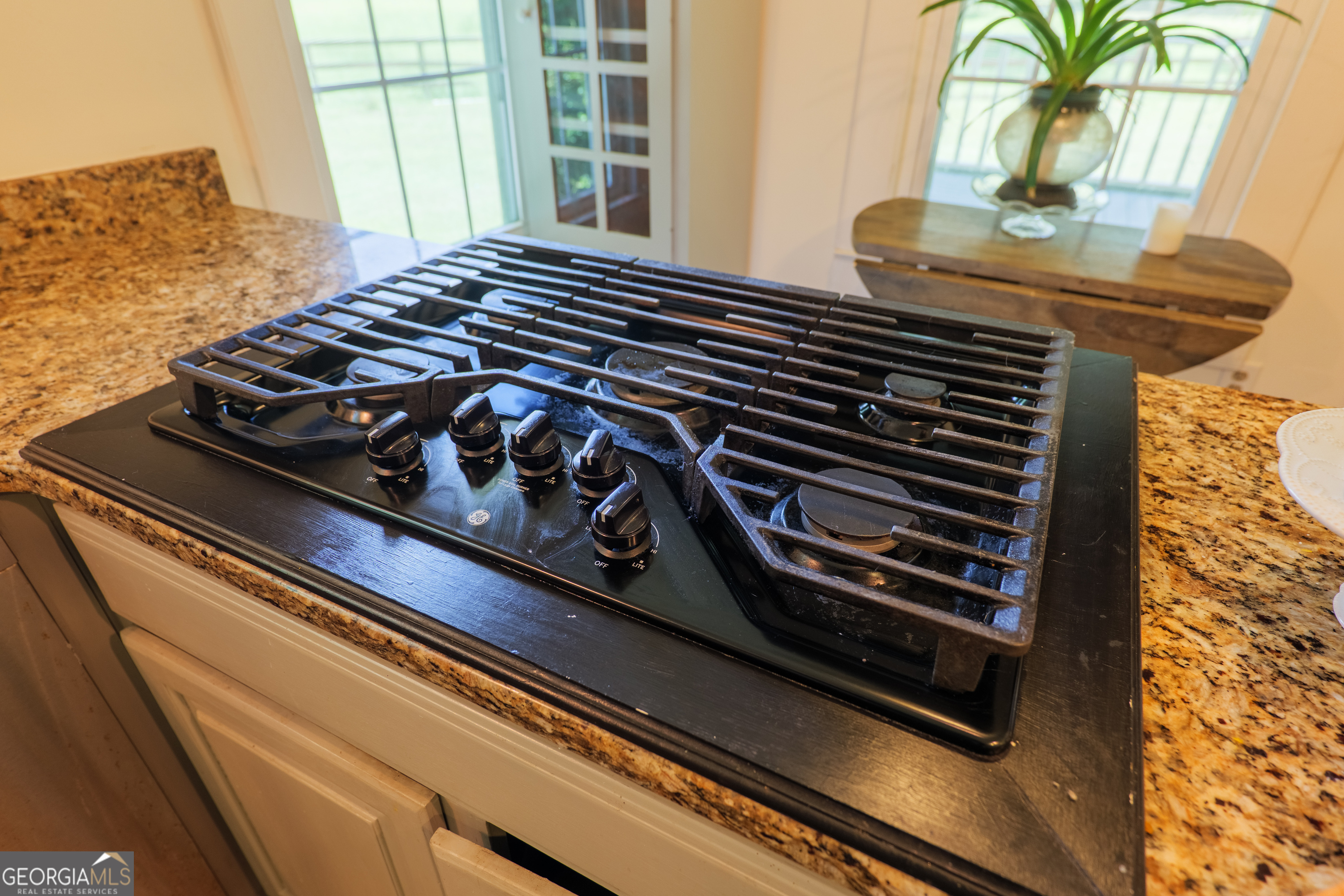 7552 Webb Road Hahira, GA 31632 - Photo 19 of 57 a close up of a stove