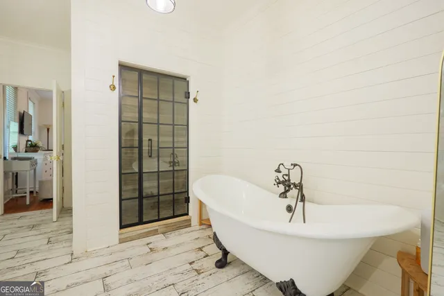 a bathroom with a bathtub