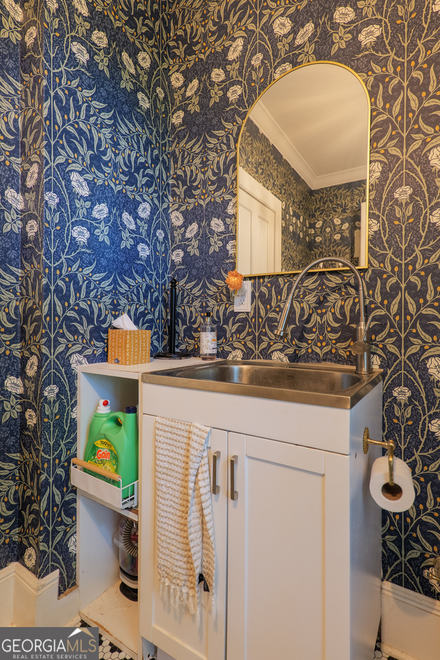 7552 Webb Road Hahira, GA 31632 - Photo 31 of 57 a bathroom with a sink mirror and vanity