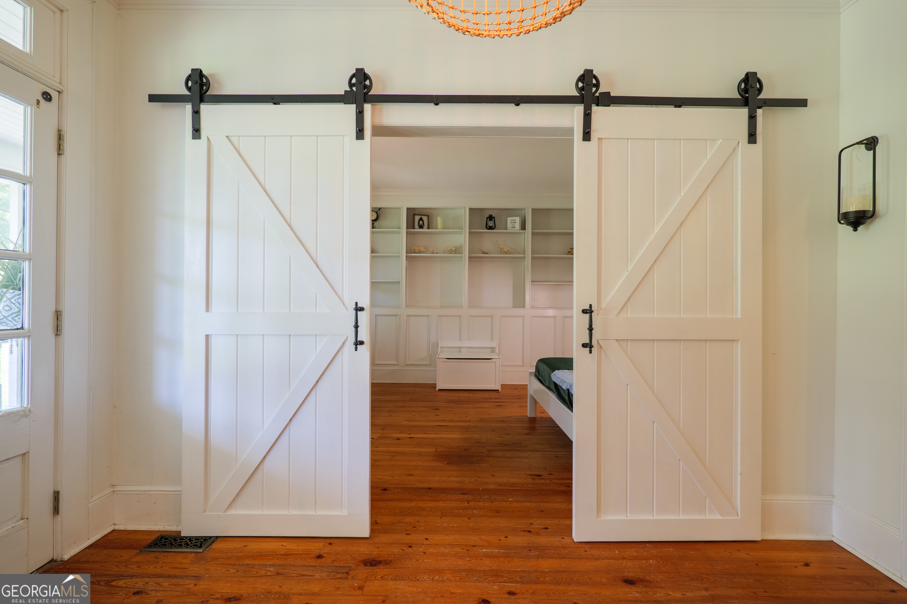 7552 Webb Road Hahira, GA 31632 - Photo 8 of 57 a view of a room with wooden floor and staircase