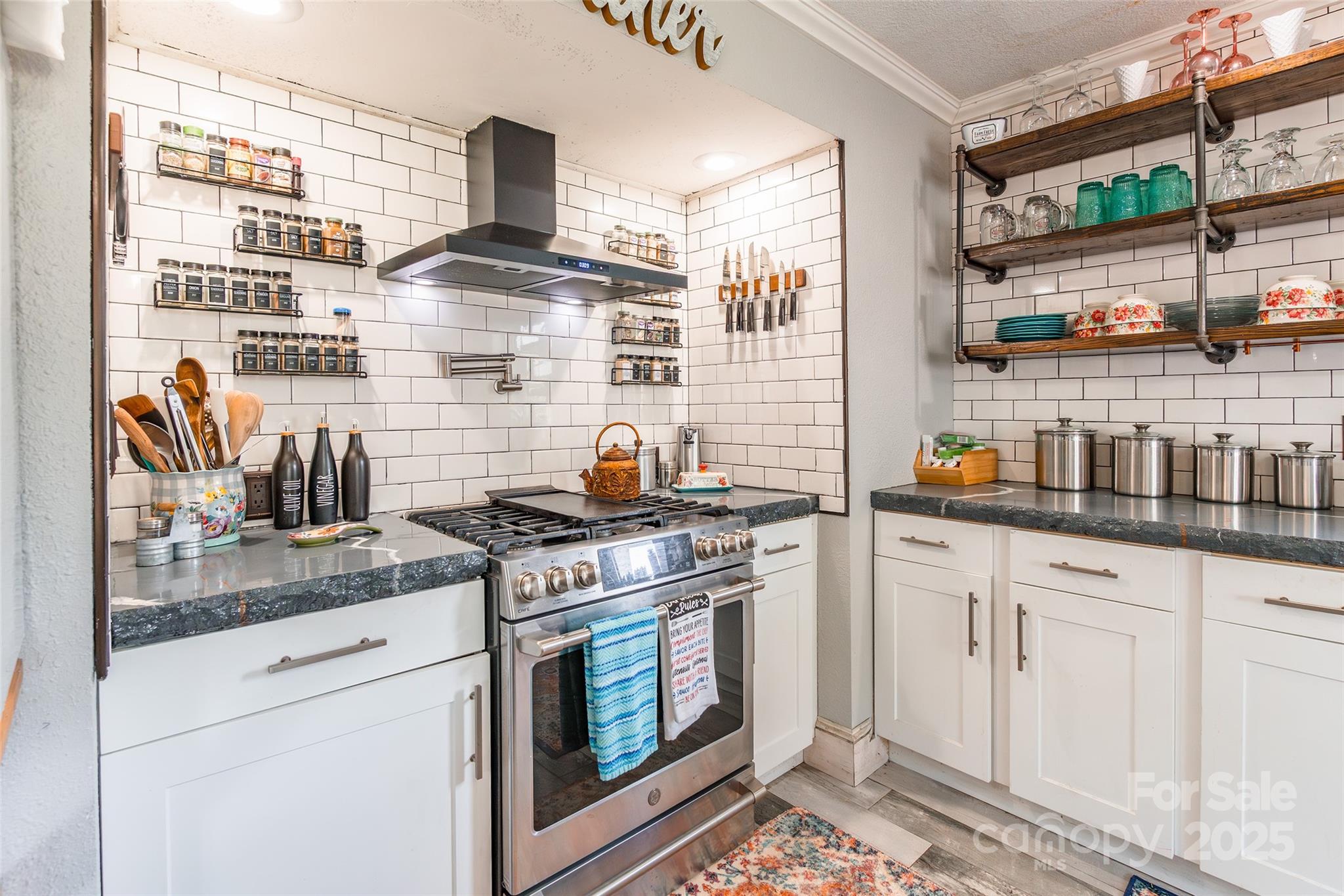106 Guffey Road Cherryville, NC 28021 - Photo 11 of 41 a kitchen with stainless steel appliances granite countertop a stove and a sink