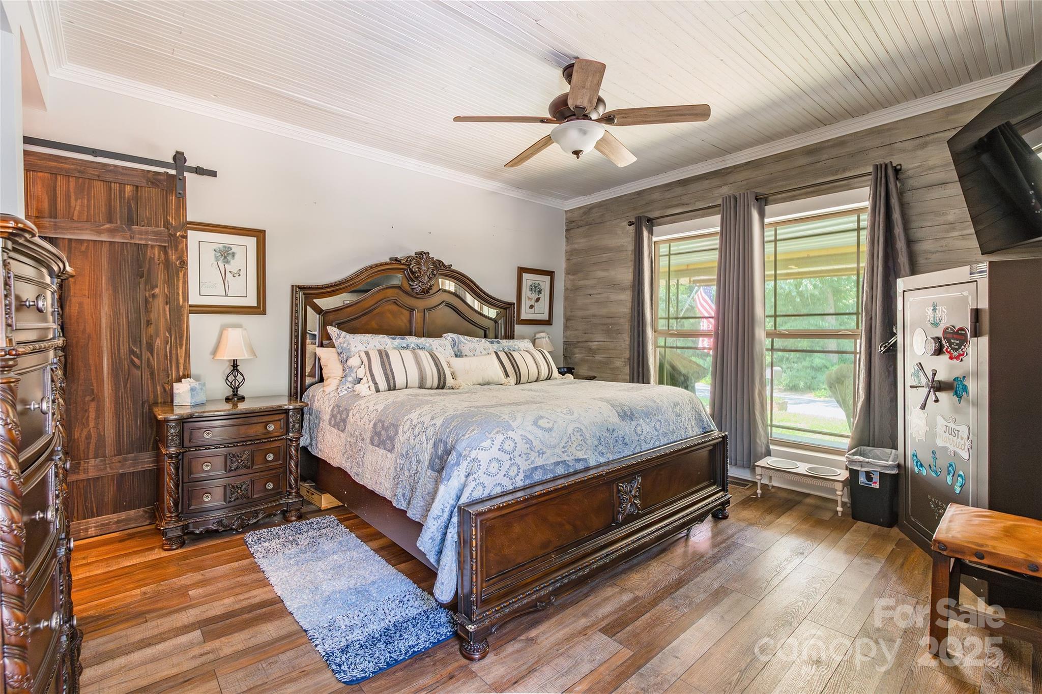 106 Guffey Road Cherryville, NC 28021 - Photo 15 of 41 a bedroom with a bed and wooden floor