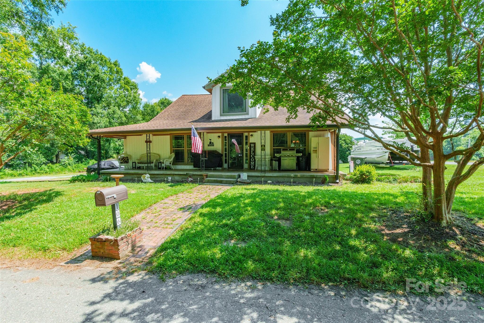 106 Guffey Road Cherryville, NC 28021 - Photo 2 of 41 a front view of a house with yard and green space