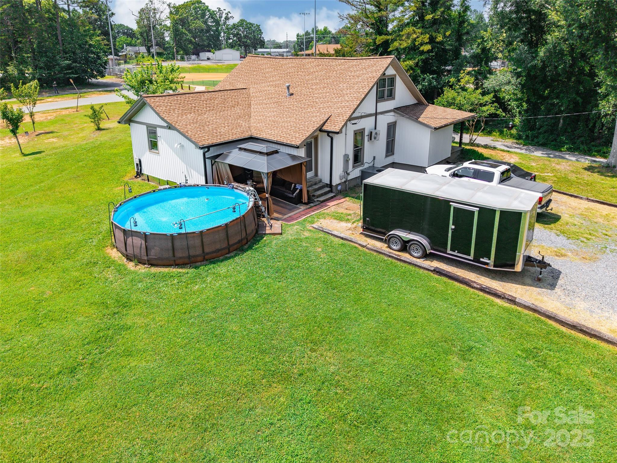 106 Guffey Road Cherryville, NC 28021 - Photo 32 of 41 an aerial view of a house with swimming pool garden and outdoor seating