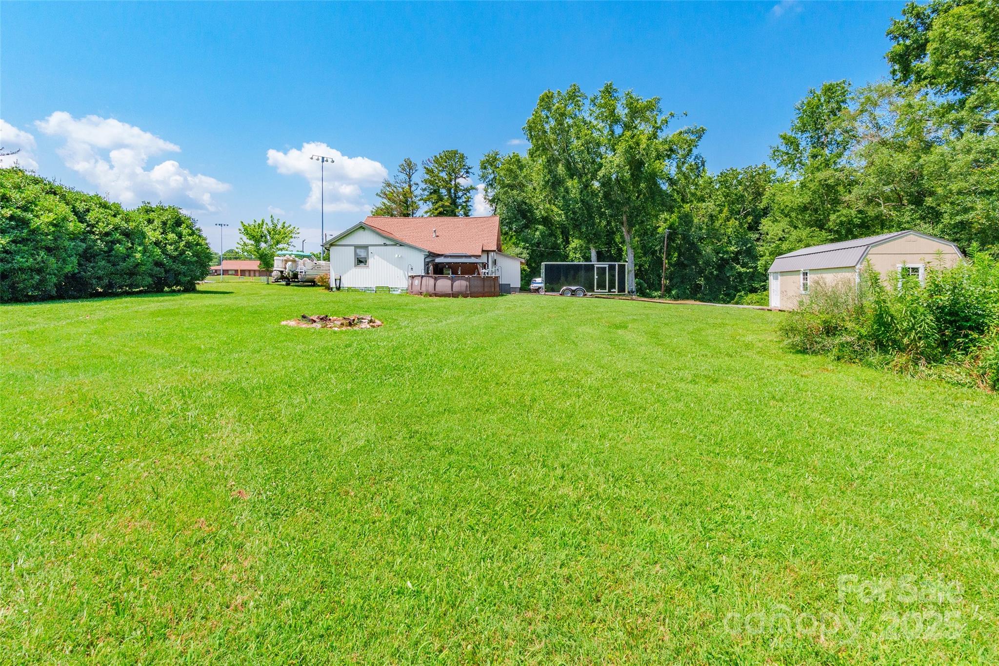 106 Guffey Road Cherryville, NC 28021 - Photo 34 of 41 a view of a house with a backyard