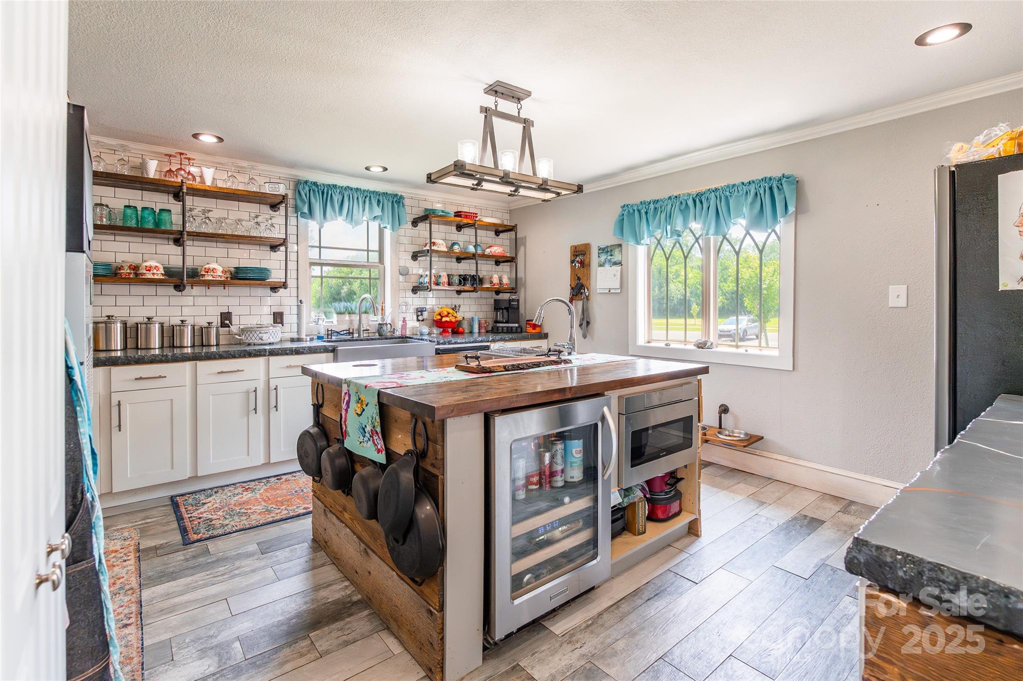 106 Guffey Road Cherryville, NC 28021 - Photo 10 of 41 a kitchen with stainless steel appliances a stove and a window