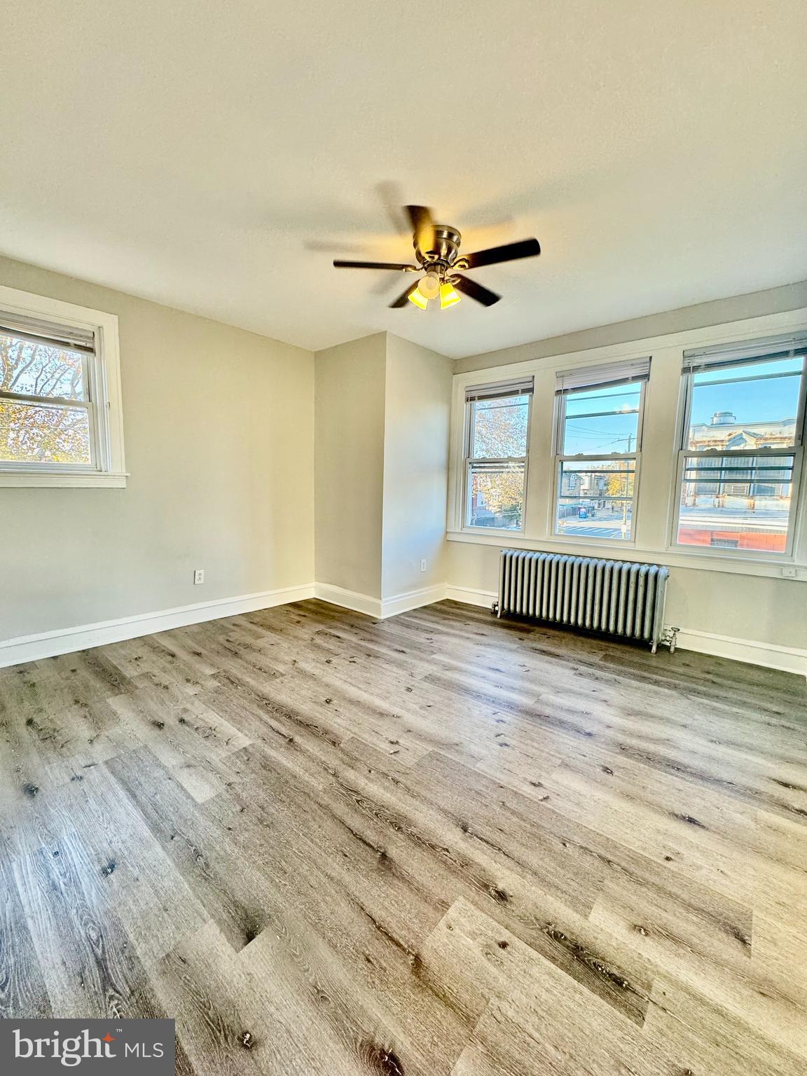 5388 Hazelhurst Street, Unit 3F Philadelphia, PA 19131 - Photo 4 of 6 a view of an empty room with a window