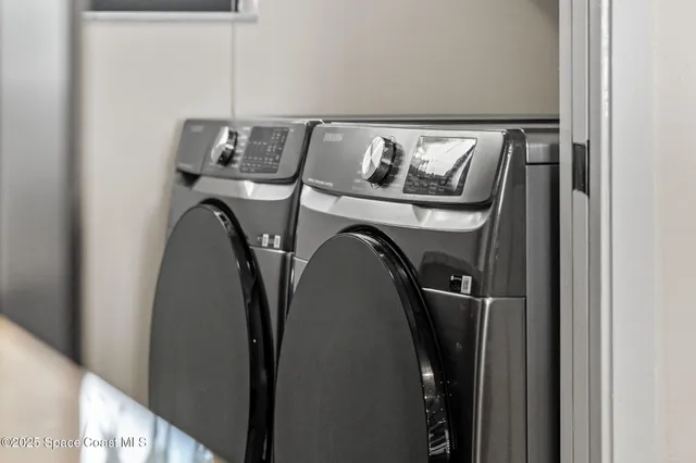 a kitchen with stainless steel appliances granite countertop wooden cabinets a stove top oven a sink and dishwasher