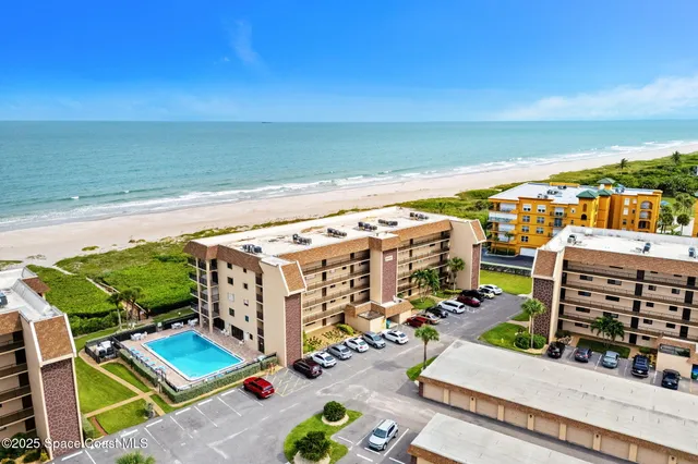 a view of a city with an ocean