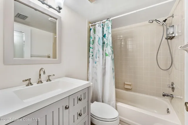 a view of a city with an ocean view