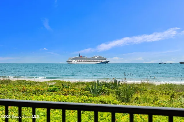 a view of ocean from a balcony