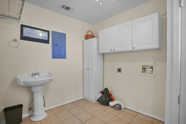 a view of room with racks on the wall