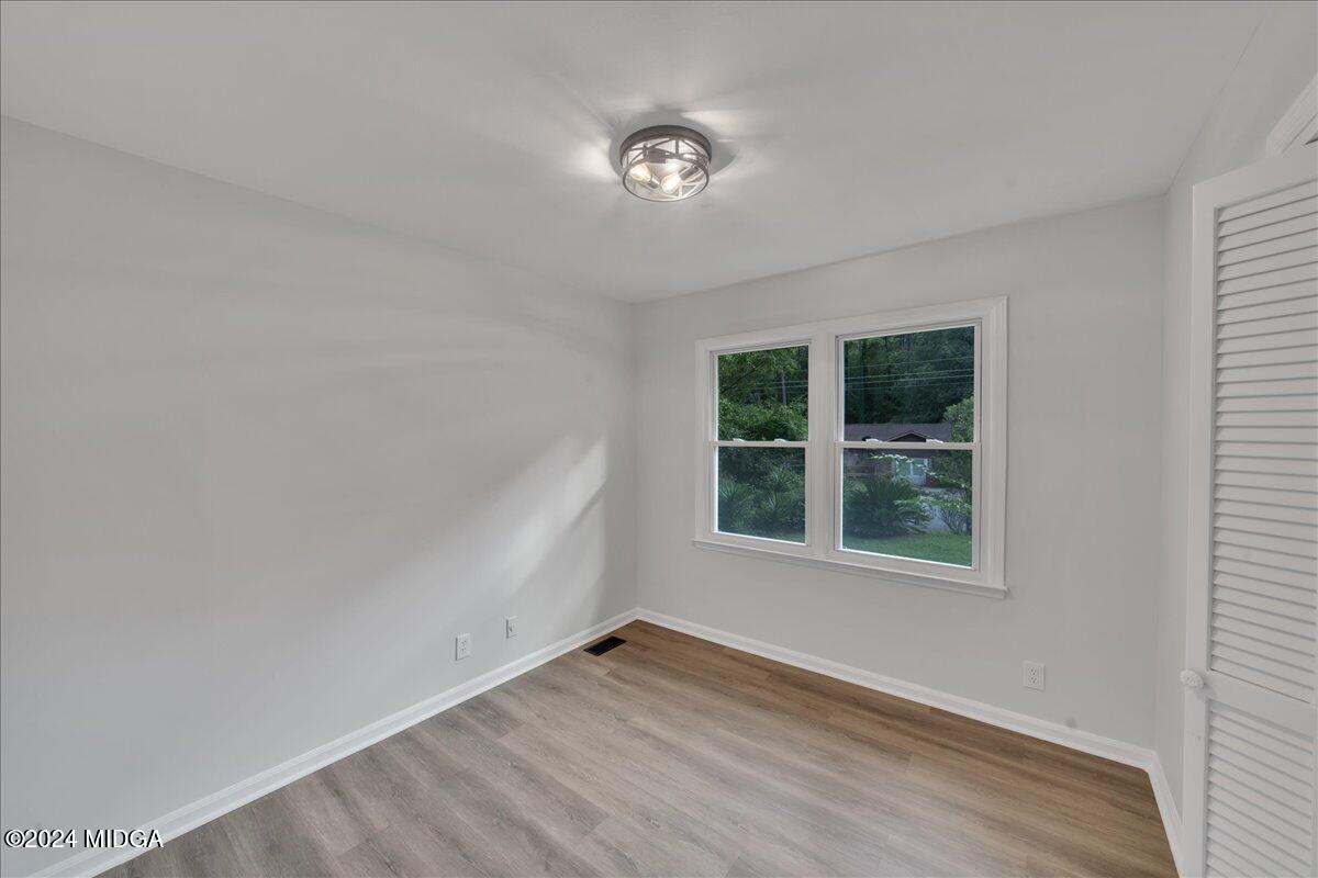 528 Table Mountain Drive Macon, GA 31220 - Photo 17 of 34 an empty room with a window