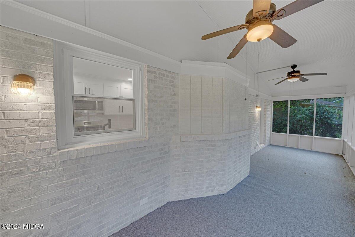 528 Table Mountain Drive Macon, GA 31220 - Photo 23 of 34 a view of a livingroom with a ceiling fan and window