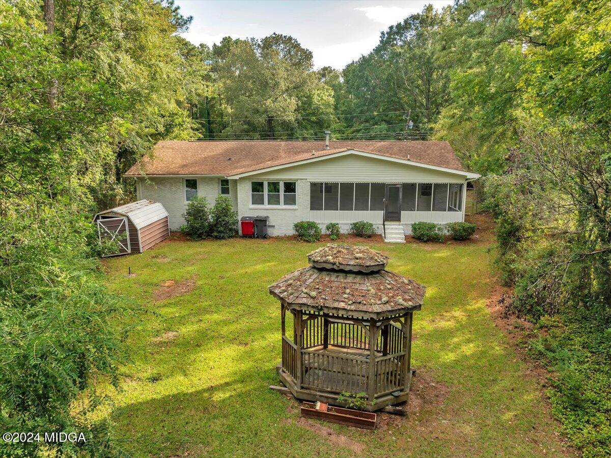 528 Table Mountain Drive Macon, GA 31220 - Photo 29 of 34 a front view of a house with yard porch and green space
