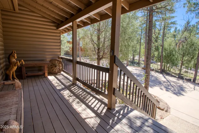 a view of balcony with wooden floor