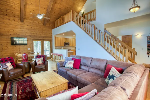 a view of a livingroom with furniture and a couch