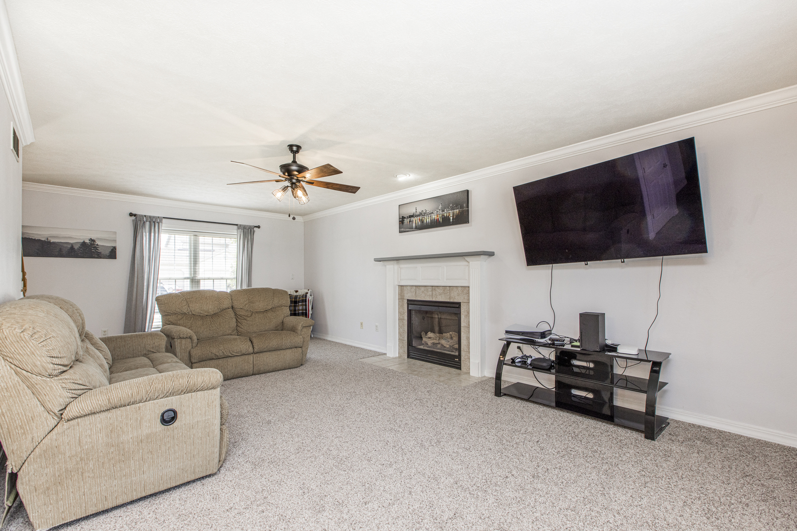 3230 Turquois Way Normal, IL 61761 - Photo 5 of 28 a living room with furniture and a flat screen tv