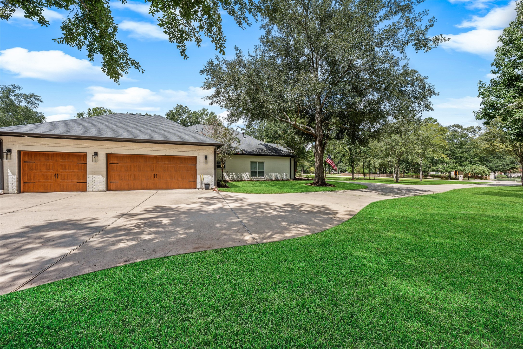 38053 Windy Ridge Trail Magnolia, TX 77355 - Photo 46 of 50 Side loading oversized three car garage with plenty of parking.