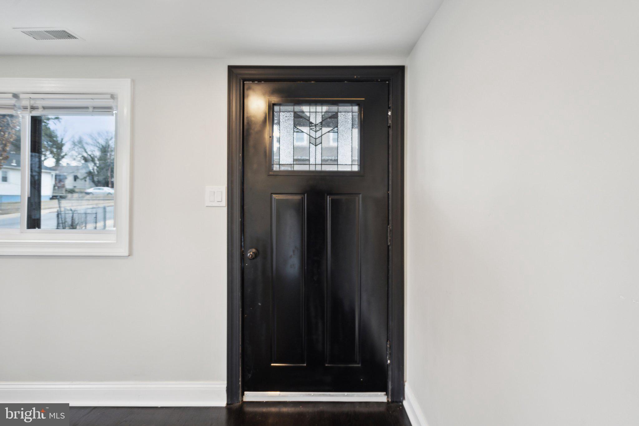 421 Dateleaf Avenue Capitol Heights, MD 20743 - Photo 19 of 39 a view of a hallway with front door