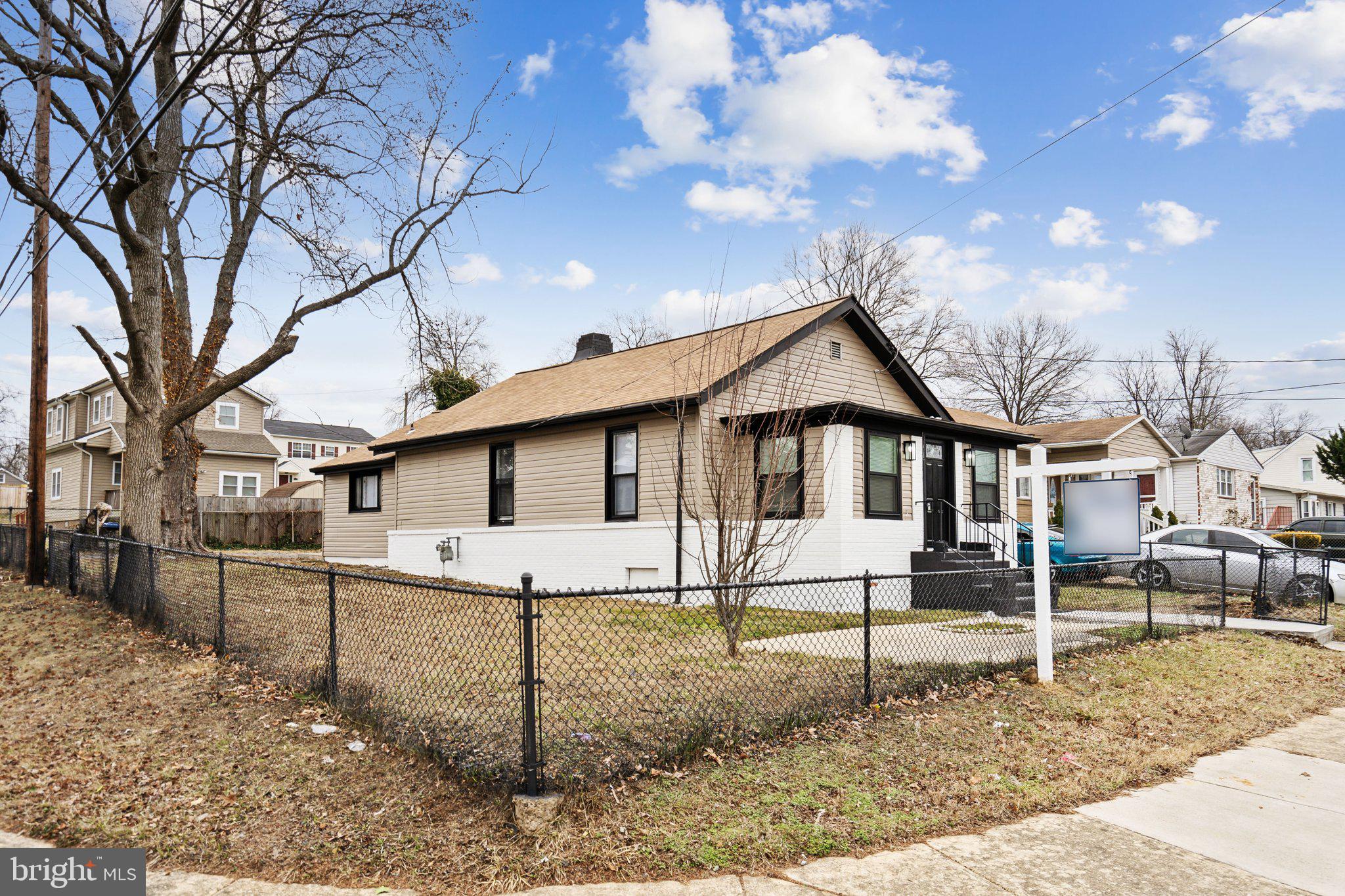 421 Dateleaf Avenue Capitol Heights, MD 20743 - Photo 35 of 39 a front view of a house with a yard
