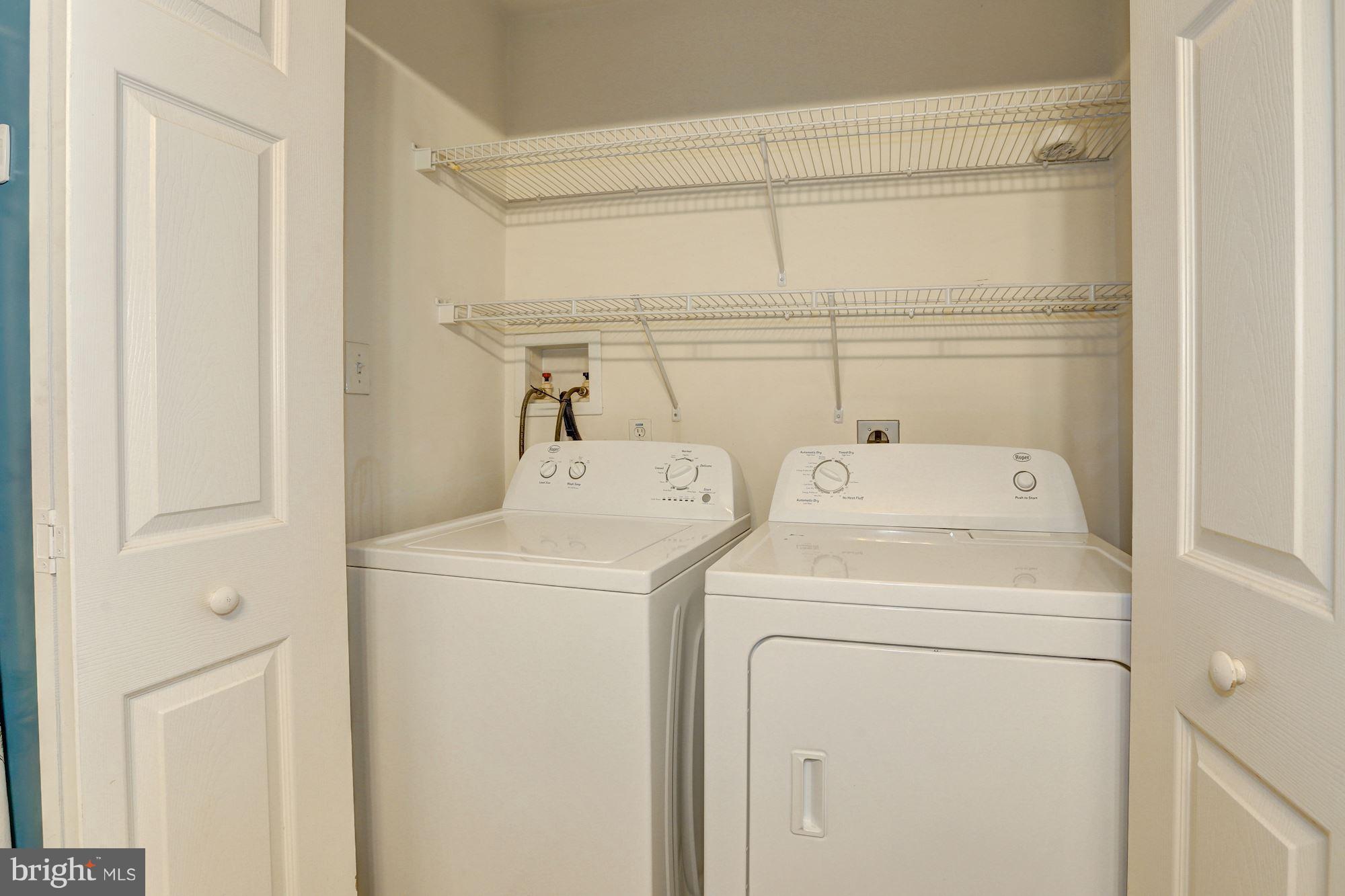 1407 Jasper Street Silver Spring, MD 20902 - Photo 14 of 21 a utility room with dryer and washer