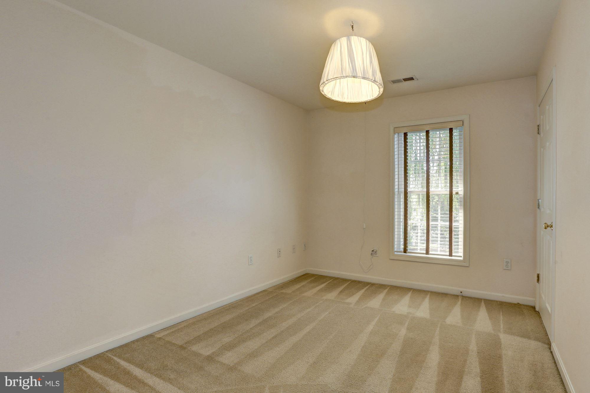 1407 Jasper Street Silver Spring, MD 20902 - Photo 10 of 21 an empty room with a window