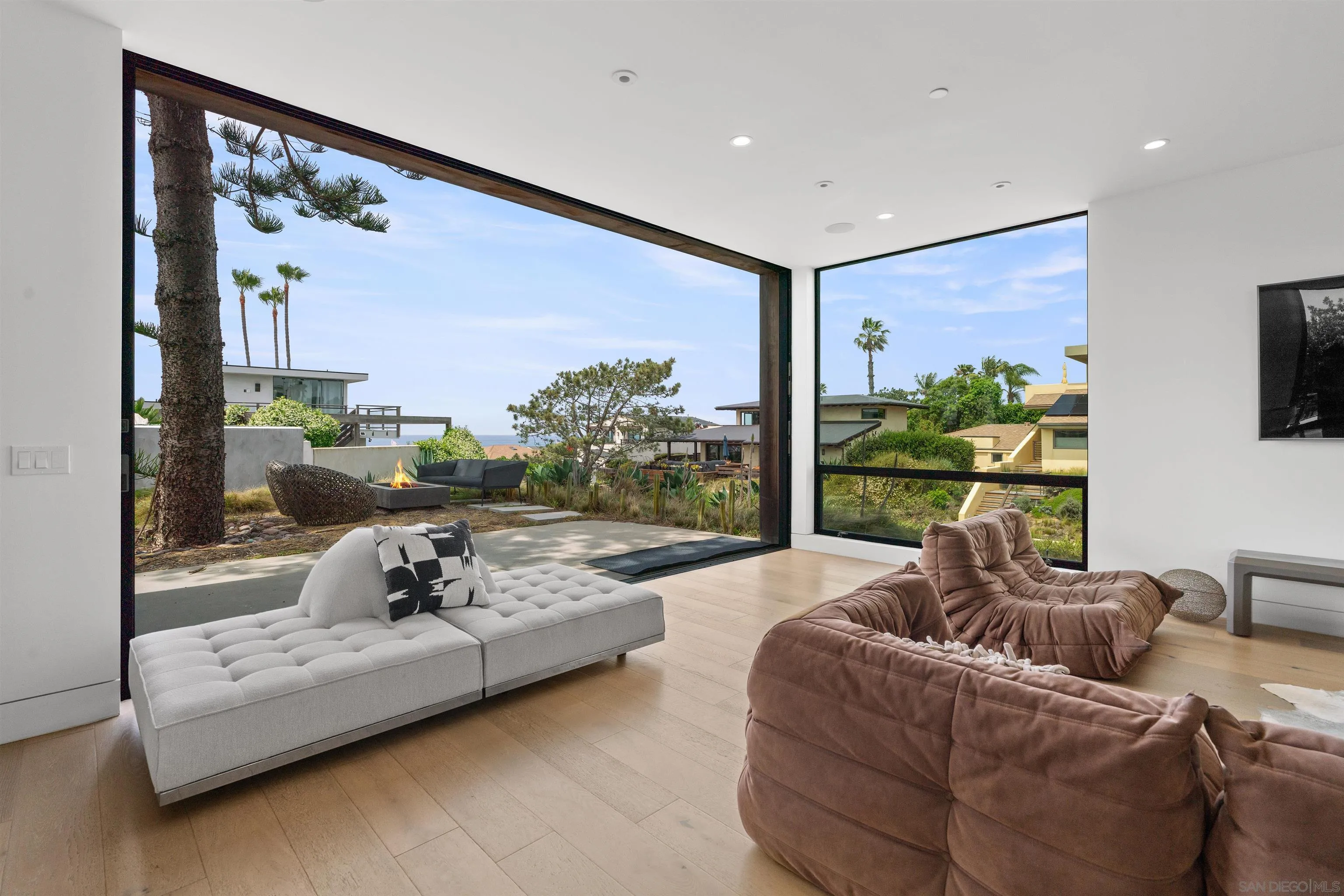 223 Ocean Street Solana Beach, CA 92075 - Photo 11 of 47 a living room with furniture and a large window