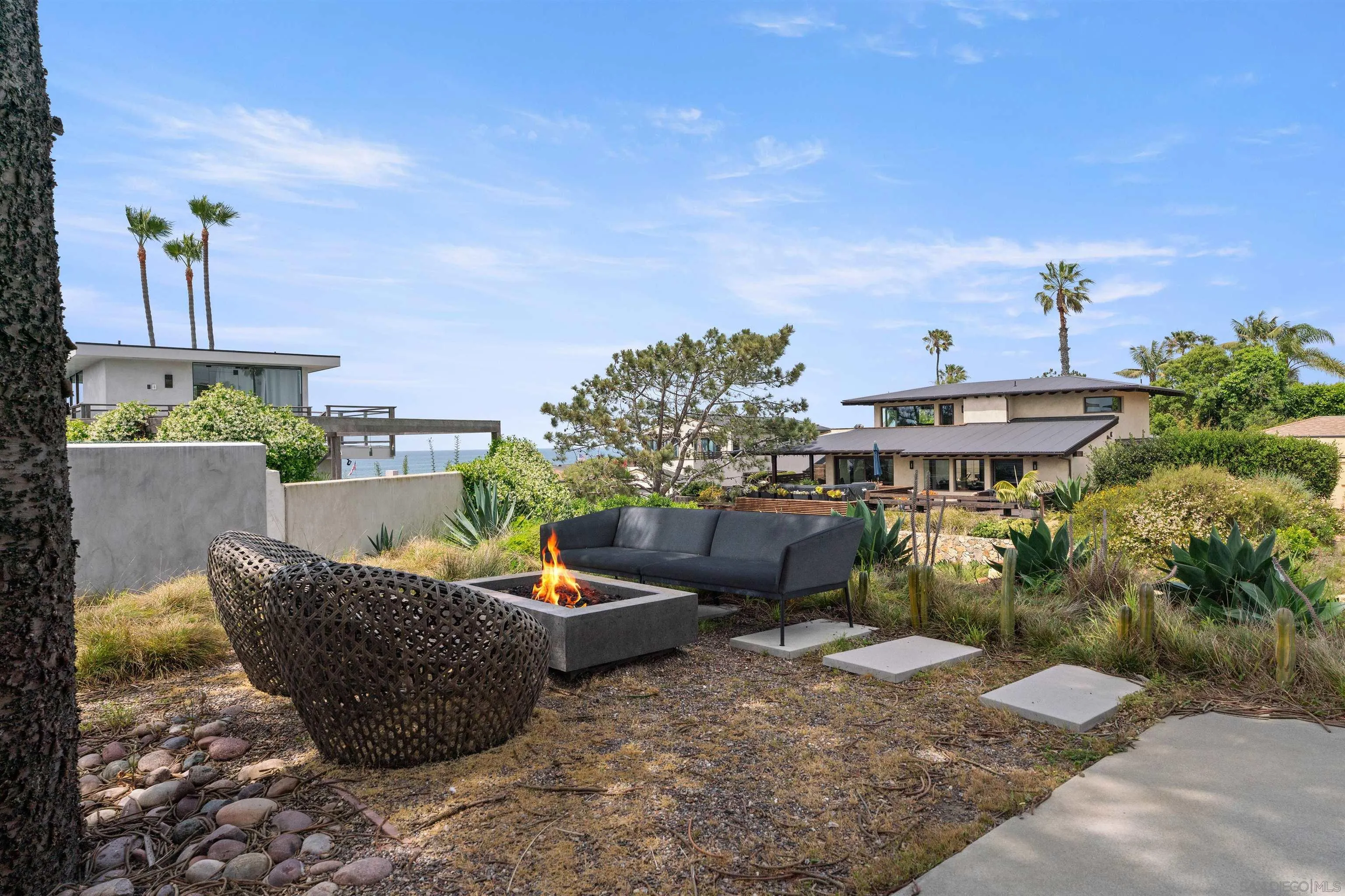 223 Ocean Street Solana Beach, CA 92075 - Photo 12 of 47 a view of a swimming pool with a patio