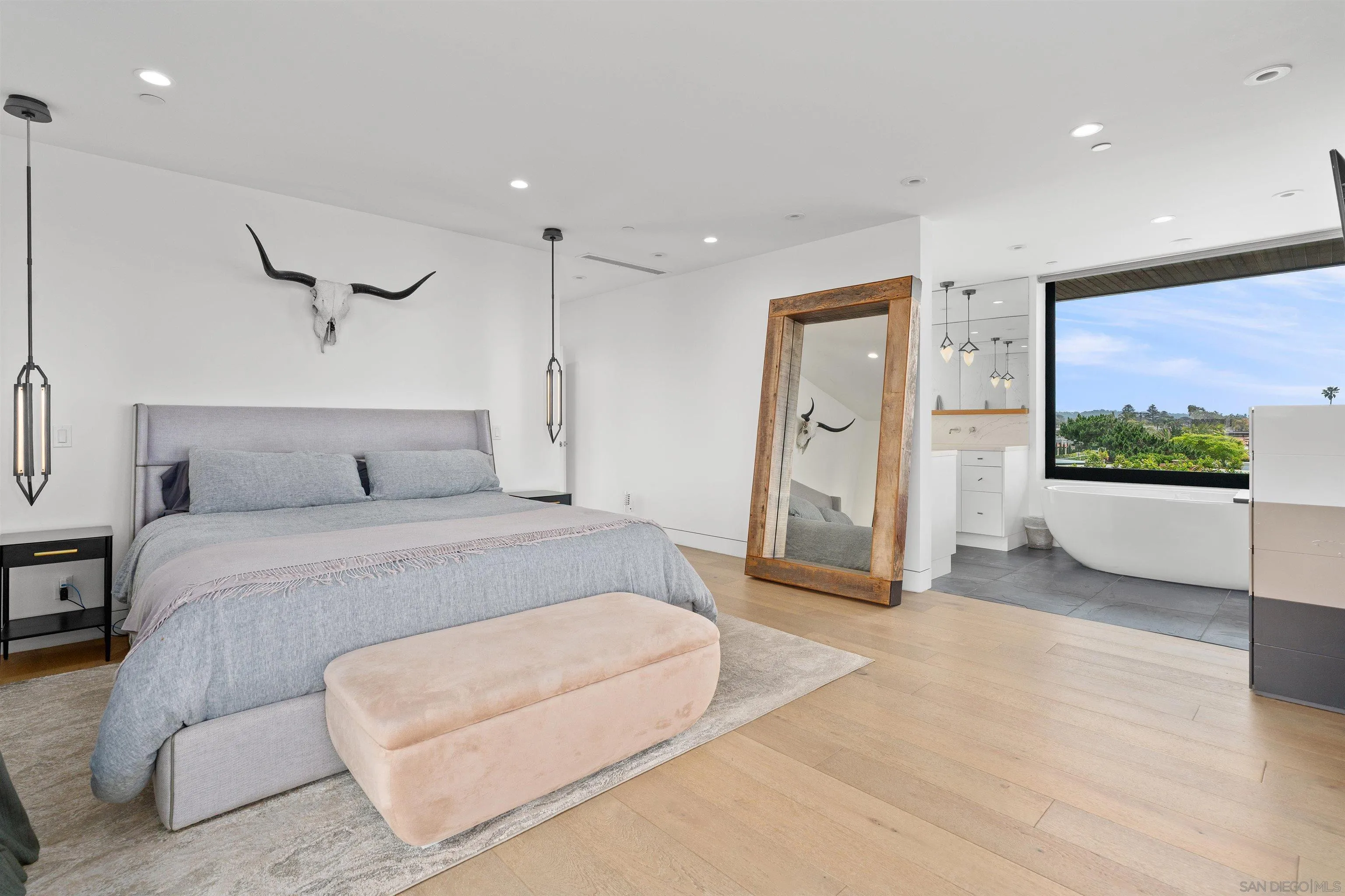 223 Ocean Street Solana Beach, CA 92075 - Photo 24 of 47 a spacious bedroom with a bed and a floor to ceiling window