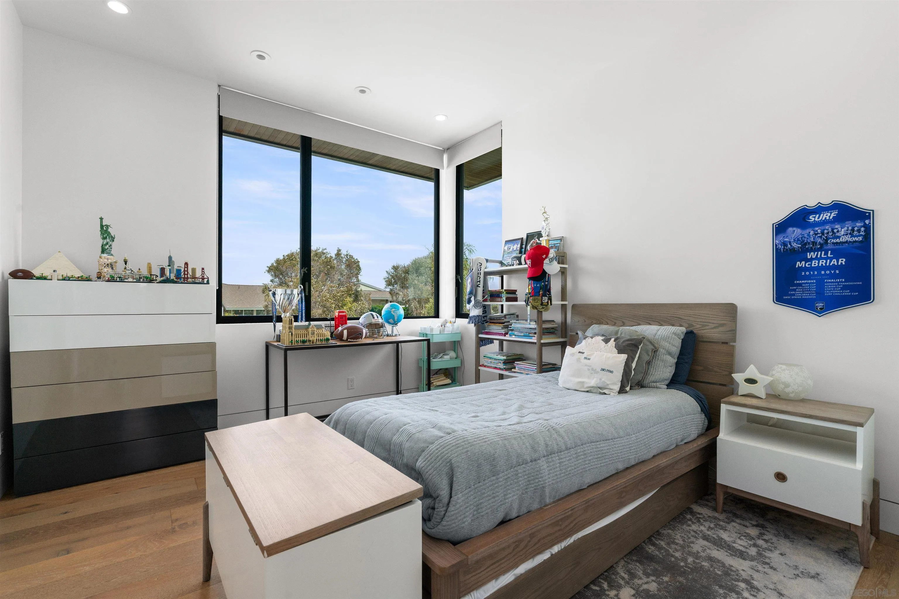 223 Ocean Street Solana Beach, CA 92075 - Photo 31 of 47 a bedroom with a bed and a dresser