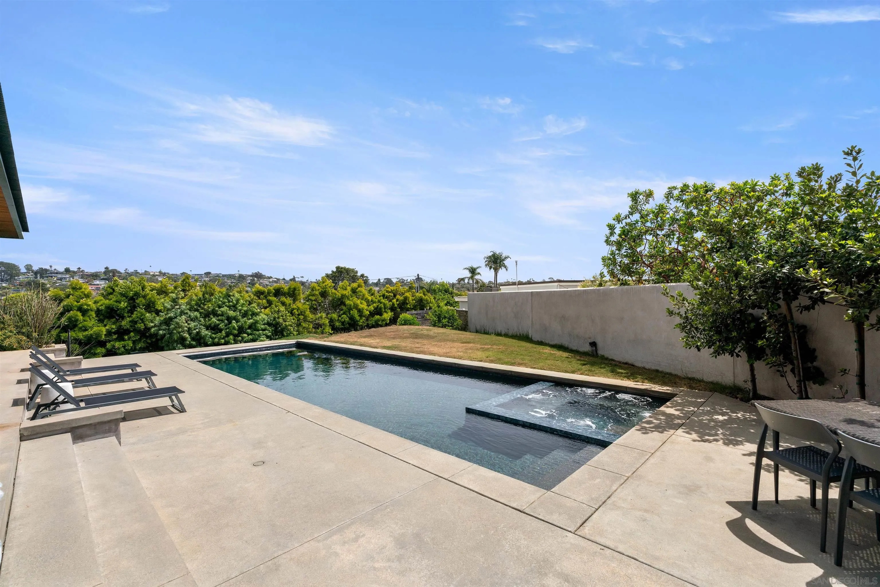 223 Ocean Street Solana Beach, CA 92075 - Photo 42 of 47 a view of swimming pool with a lounge chair