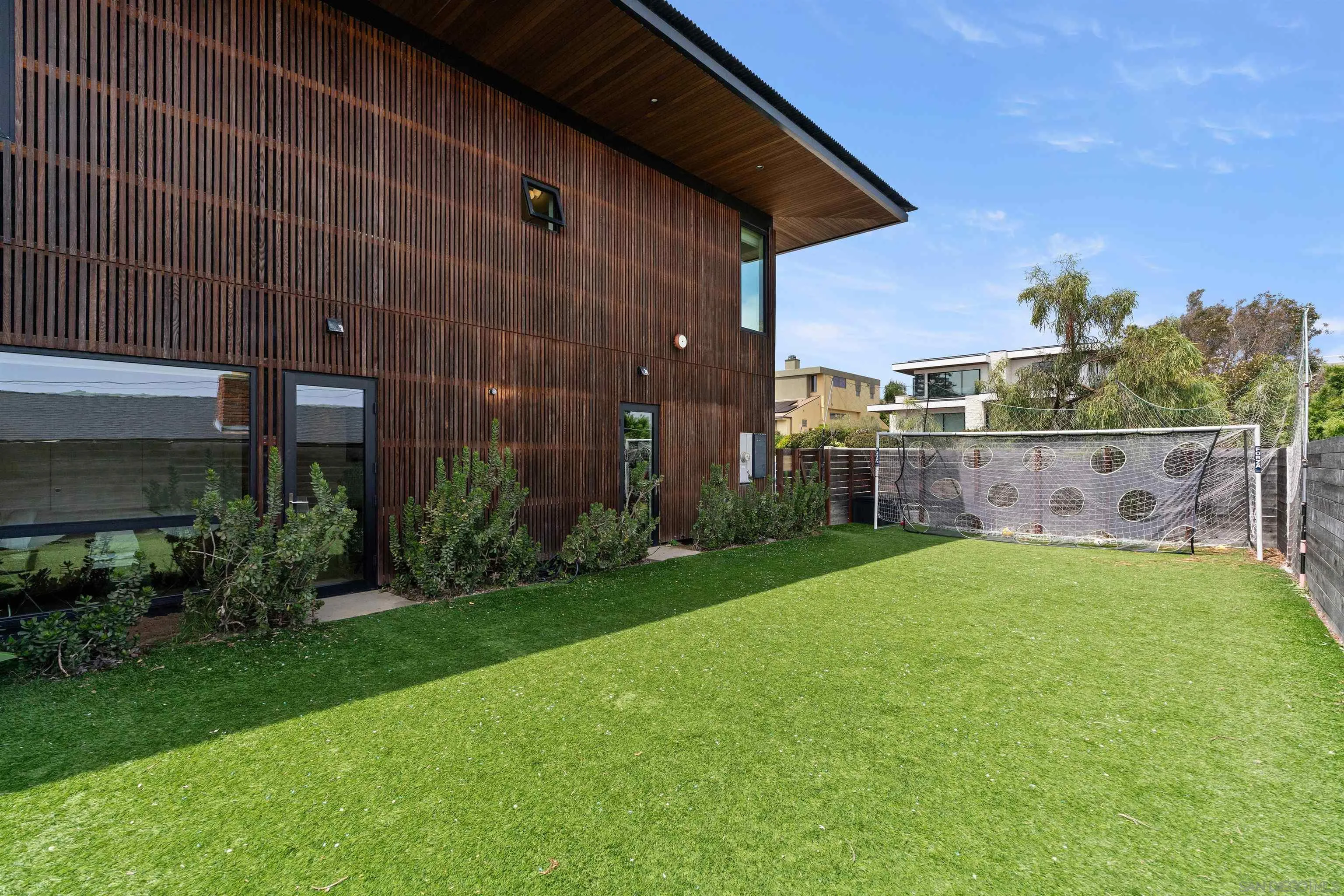 223 Ocean Street Solana Beach, CA 92075 - Photo 44 of 47 a view of backyard with barbeque oven and plants