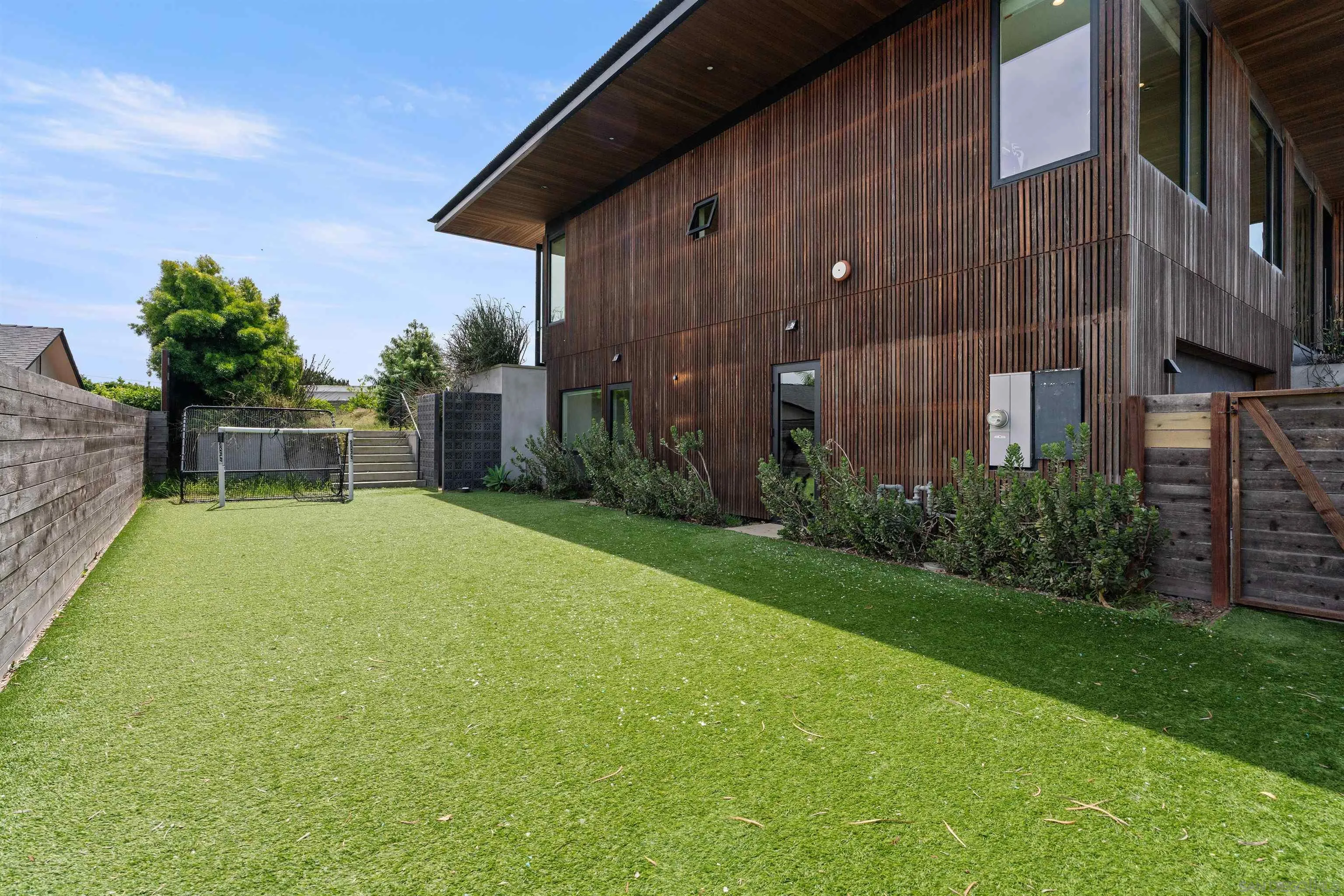 223 Ocean Street Solana Beach, CA 92075 - Photo 45 of 47 a backyard of a house with lots of green space